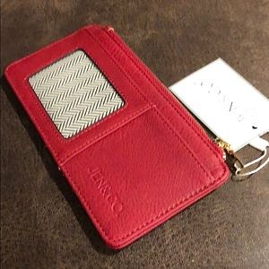 Wallet by Jen & CO button strap protects cards.